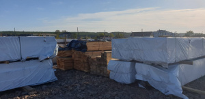 Delivery of house kits and the start of construction of the recreation center
