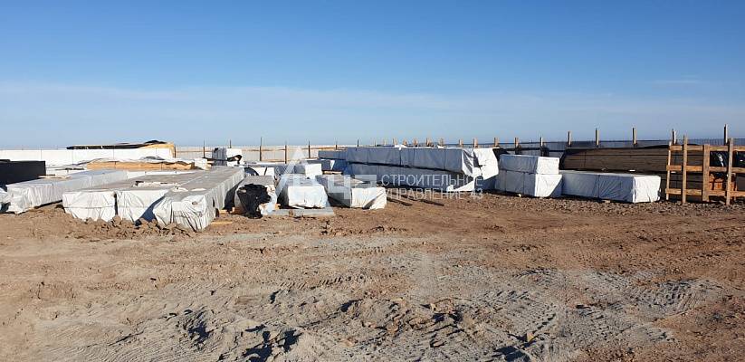 Delivery of house kits and the start of construction of the recreation center